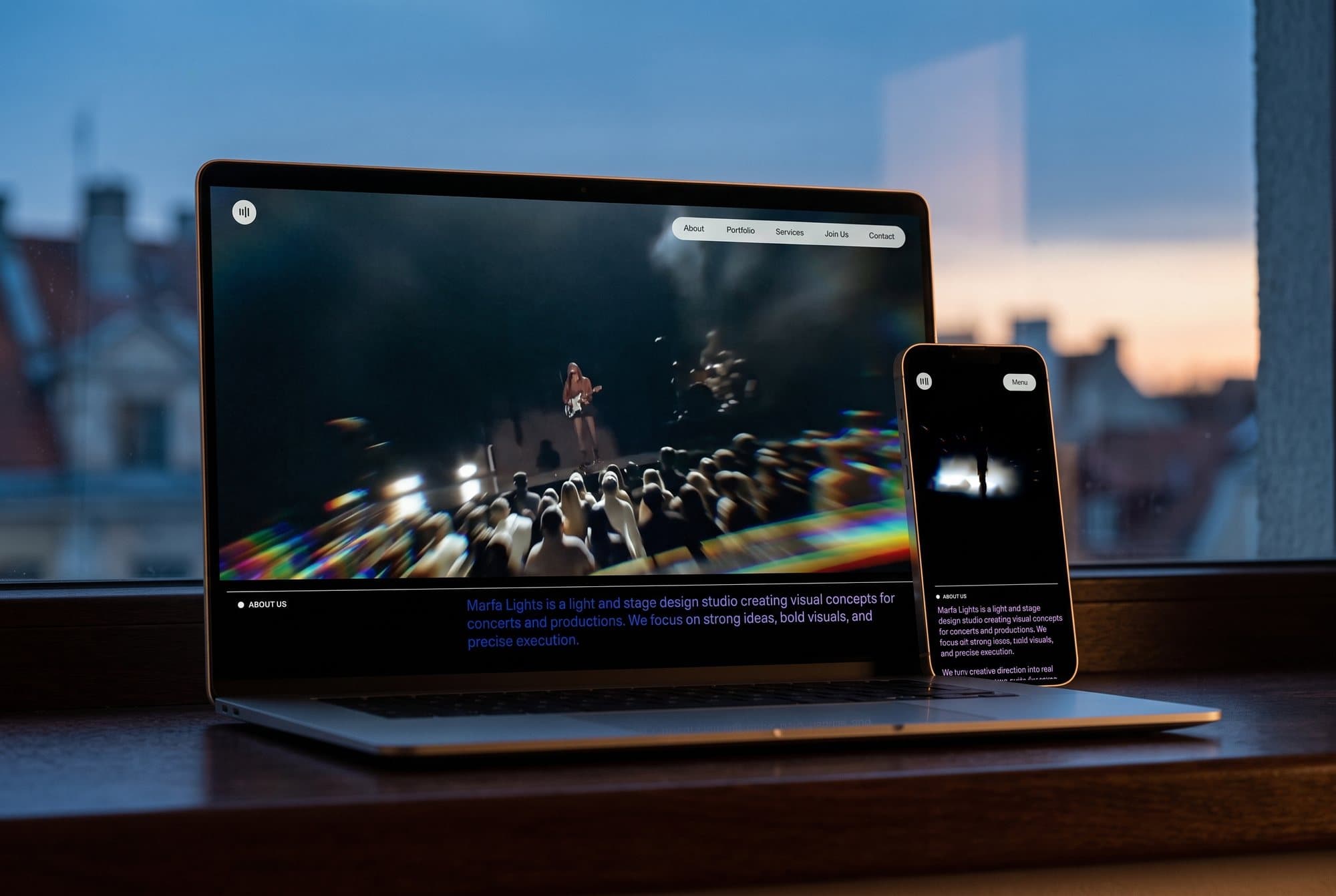 The Marfa Lights website on a laptop and a phone