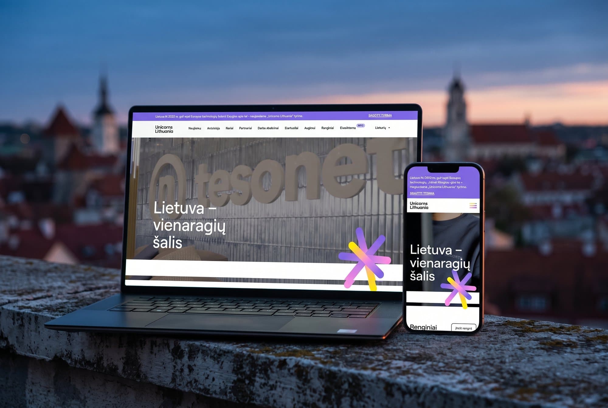 The Unicorns Lithuania website on a laptop and a phone